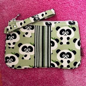 Adorable panda clutch purse. Never used. Green polka dots inside with zip pouch.
